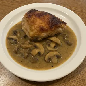 BROILED BONE-IN CHICKEN THIGH WITH MUSHROOM SAUCE